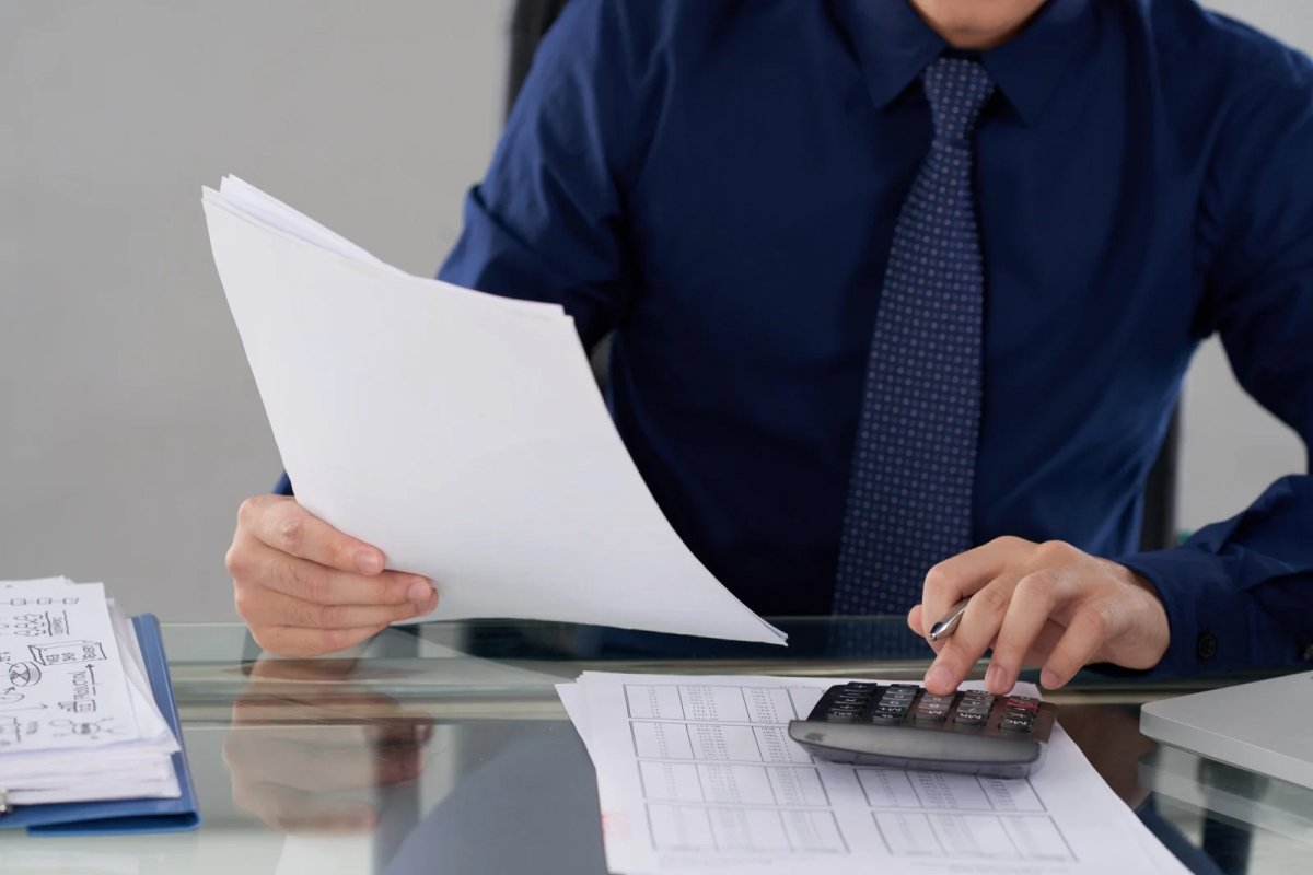 Clerk Checking Documents