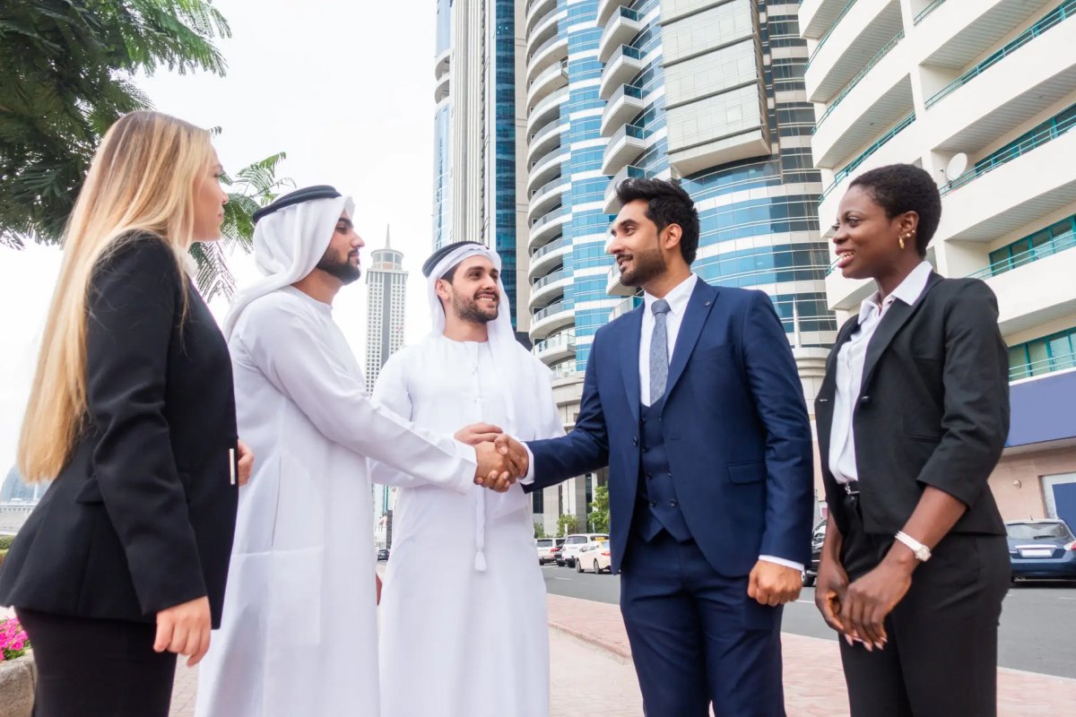 Business professionals shaking hands