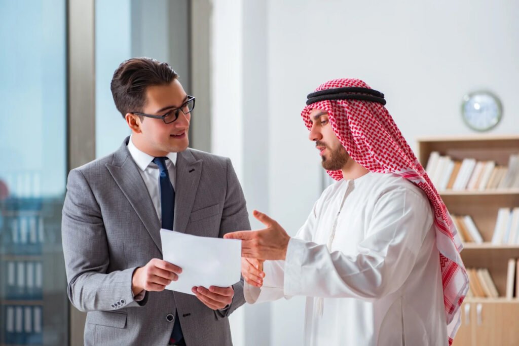 Two men in traditional Middle Eastern attire